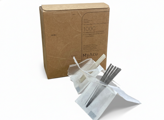 Cardboard box with MyAcu branding, containing acupuncture needles and accessories on a white background.